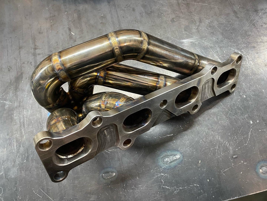 DarkLight Fabrication turbo exhaust manifold for Mazda Miata 1.6L engine