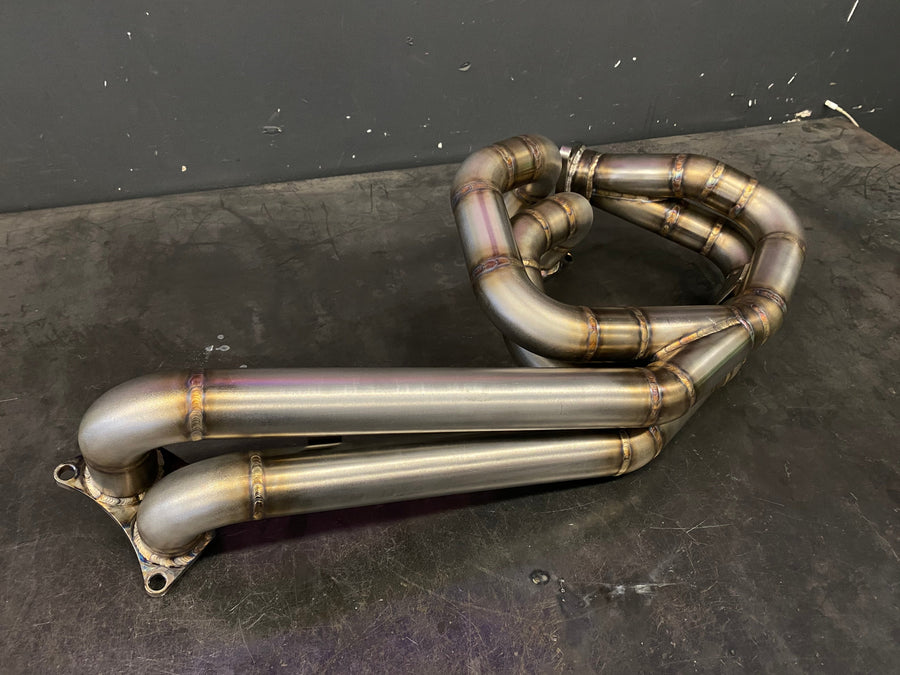 Subaru WRX/STI/FXT equal length turbo manifold built by DarkLight Fabrication