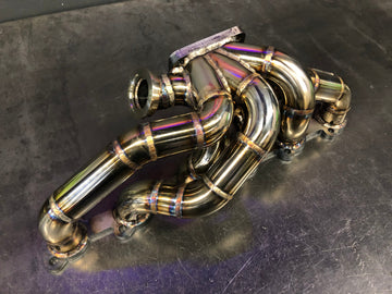BMW E30 M20 T3 turbo exhaust manifold fabricated by DarkLight Fabrication